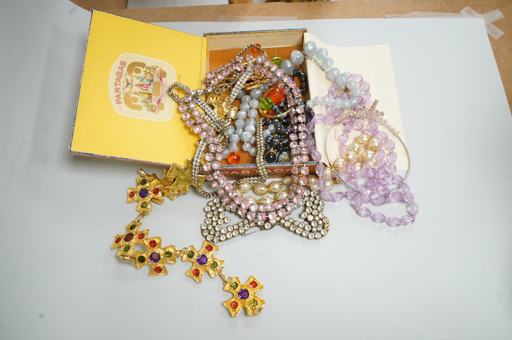 A group of assorted costume jewellery, glass beads etc.